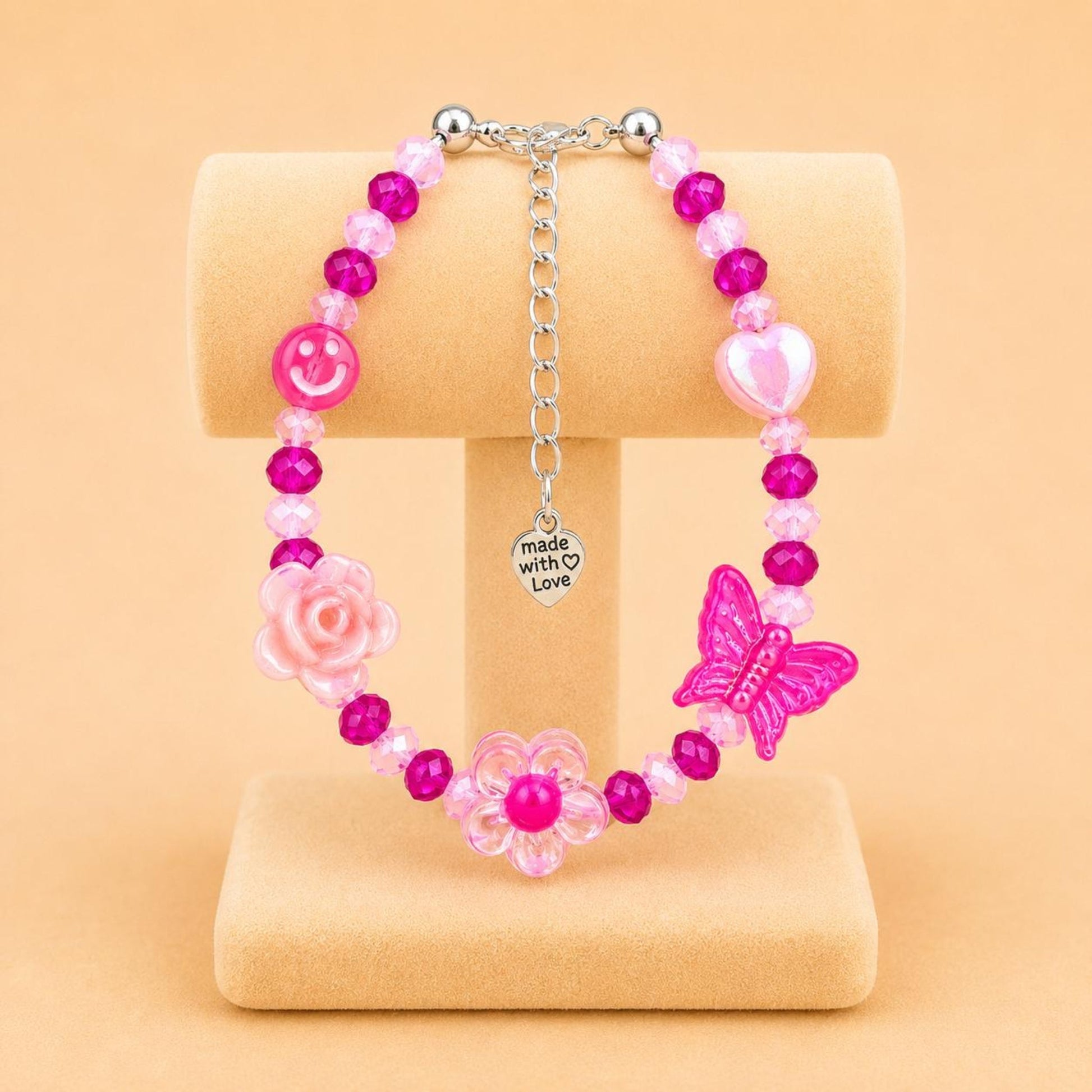 Handmade BLUSH RADIANCE bracelet with pink and fuchsia glass and acrylic beads on nylon string with stainless steel clasp