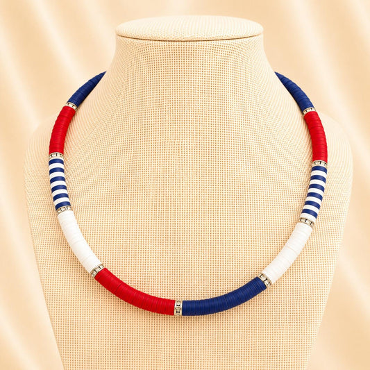 Handmade SIMPLICITY necklace with white, blue, red polymer clay beads and silver accents on nylon string