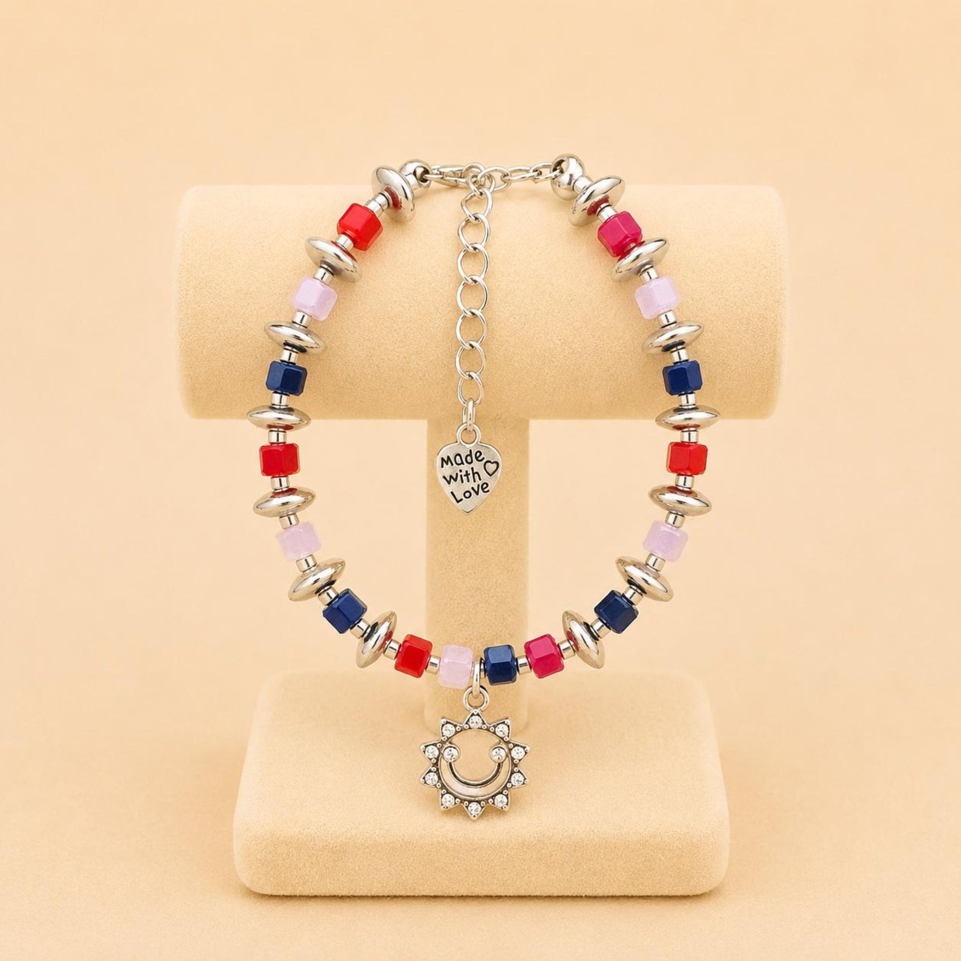 Handmade bracelet with silver smiley face pendant and colorful beads