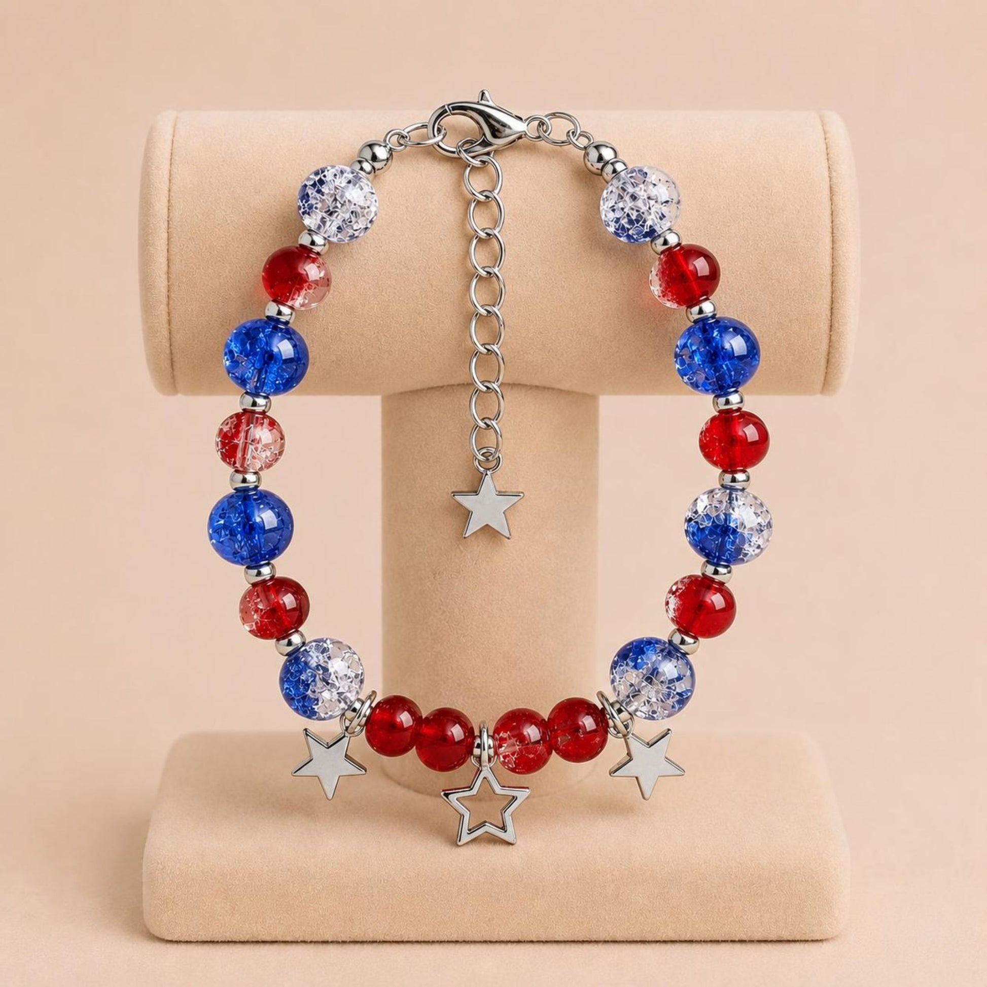 Handmade TWILIGHT STARS bracelet with blue and red glass beads, silver accents, and star charms on nylon string
