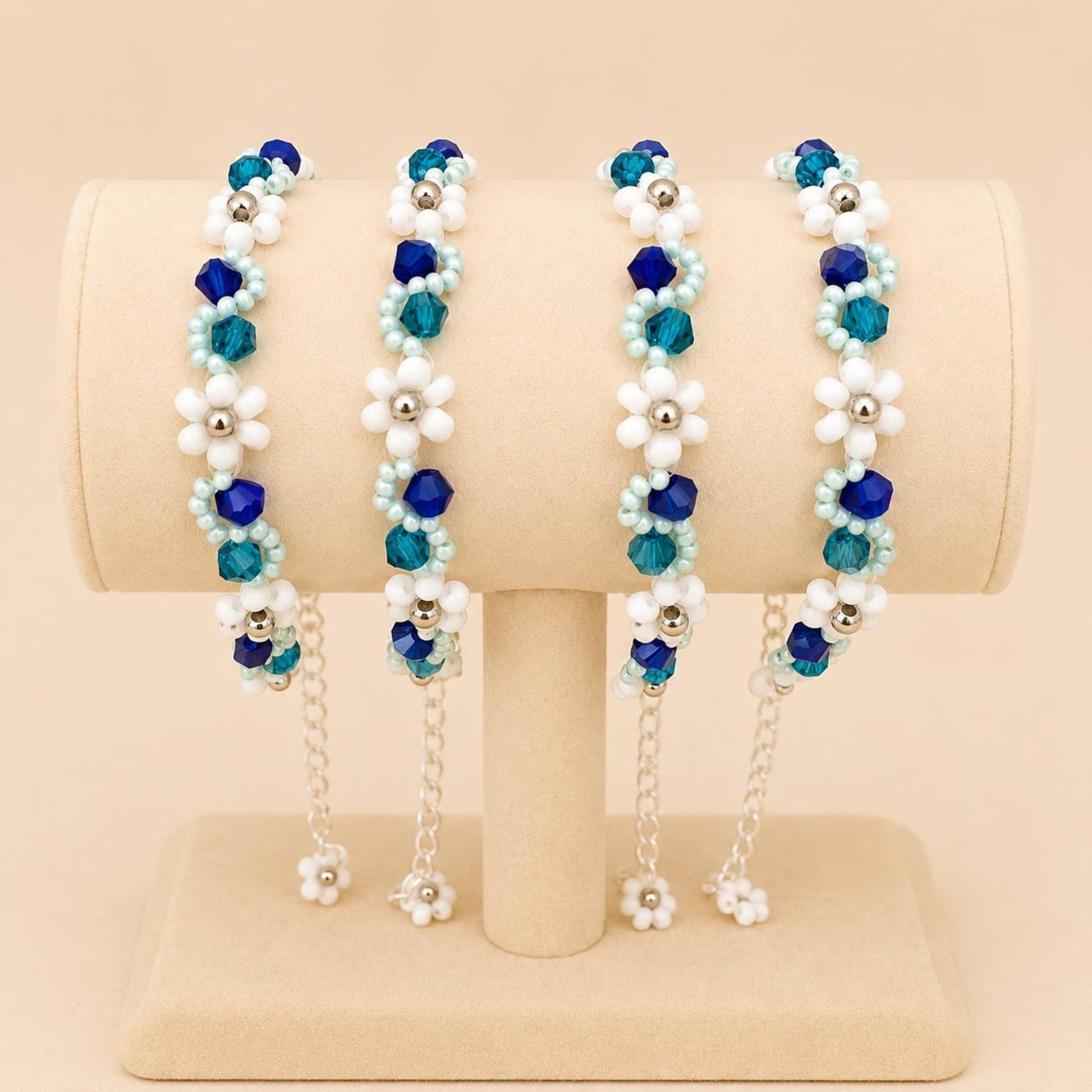 SEA WHISPER Handmade bracelet with white, indigo, turquoise, silver, and light blue beads on stainless steel chain