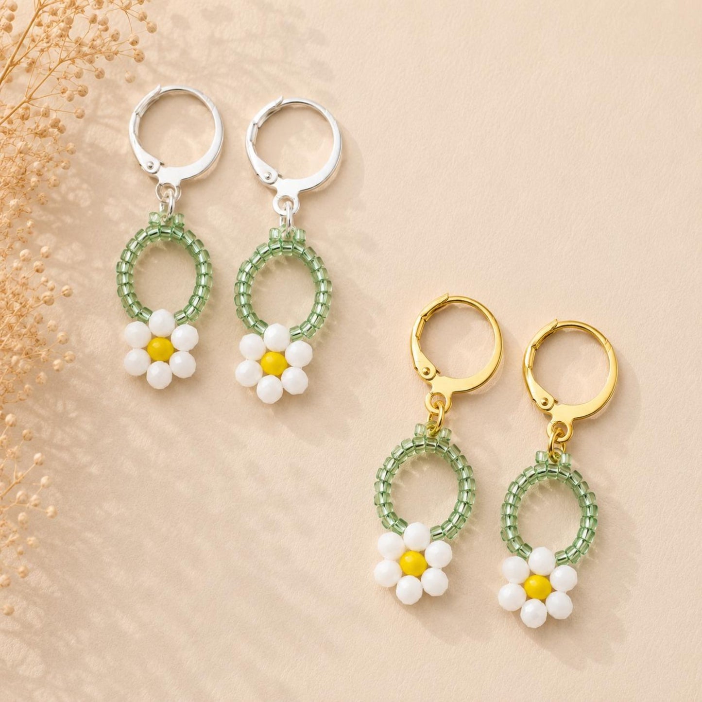 Handcrafted SUNNY DAISIES earrings with gold and silver stainless steel hoops, made with white, yellow, and green glass beads