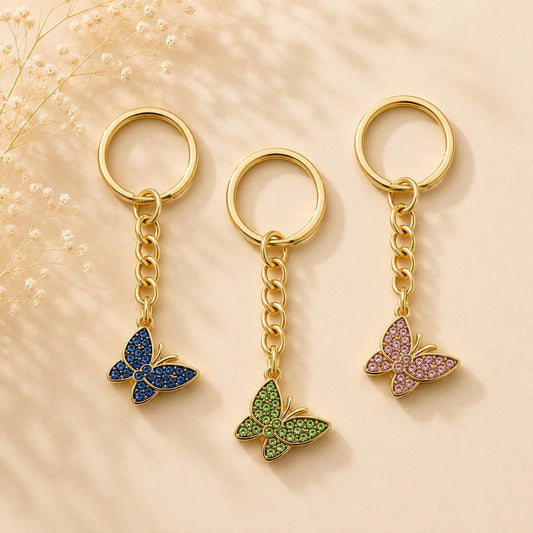 Golden butterfly keychain with blue rhinestones, handmade elegant accessory