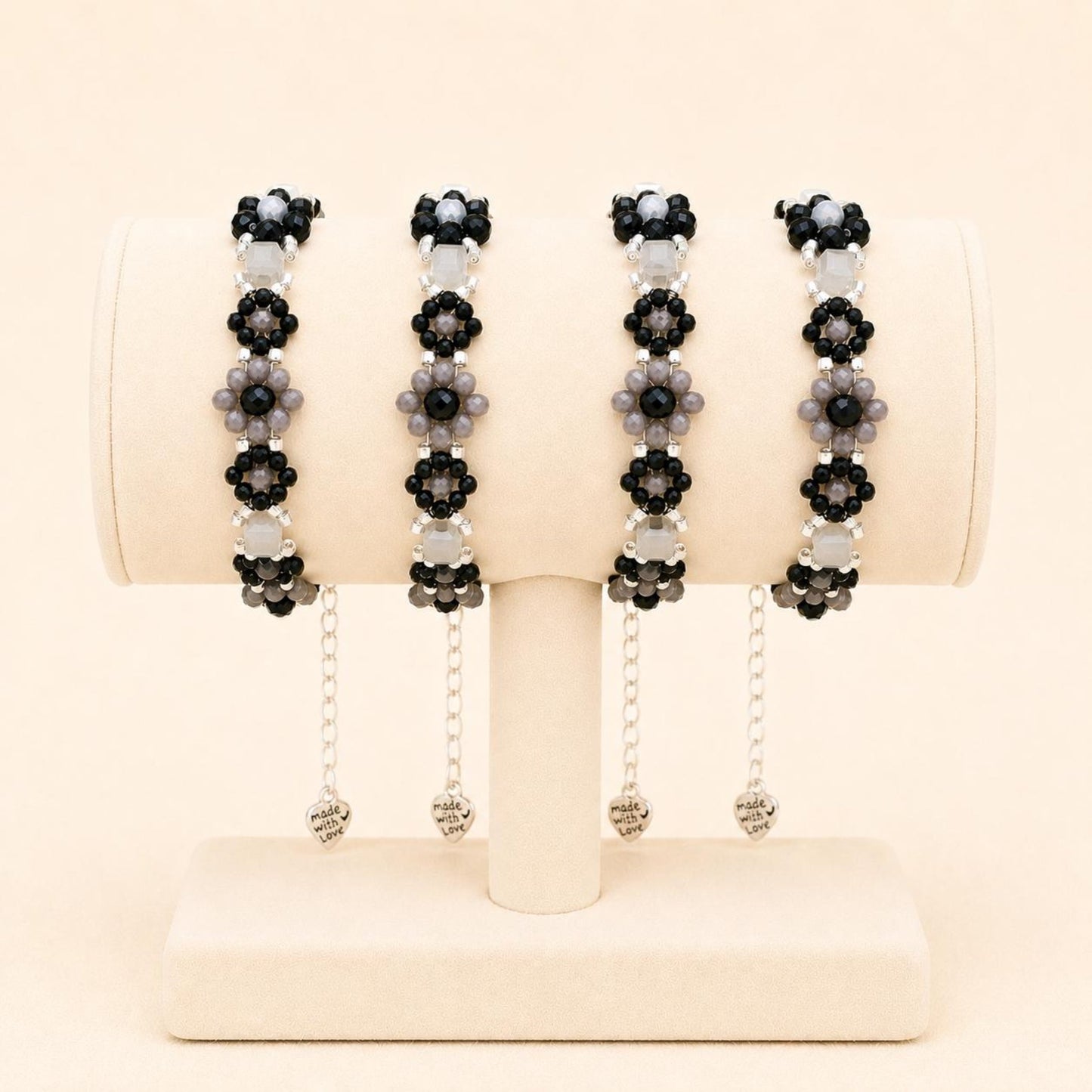 Handmade MIDNIGHT BLOSSOM bracelet with black, grey, and silver beads on stainless steel chain