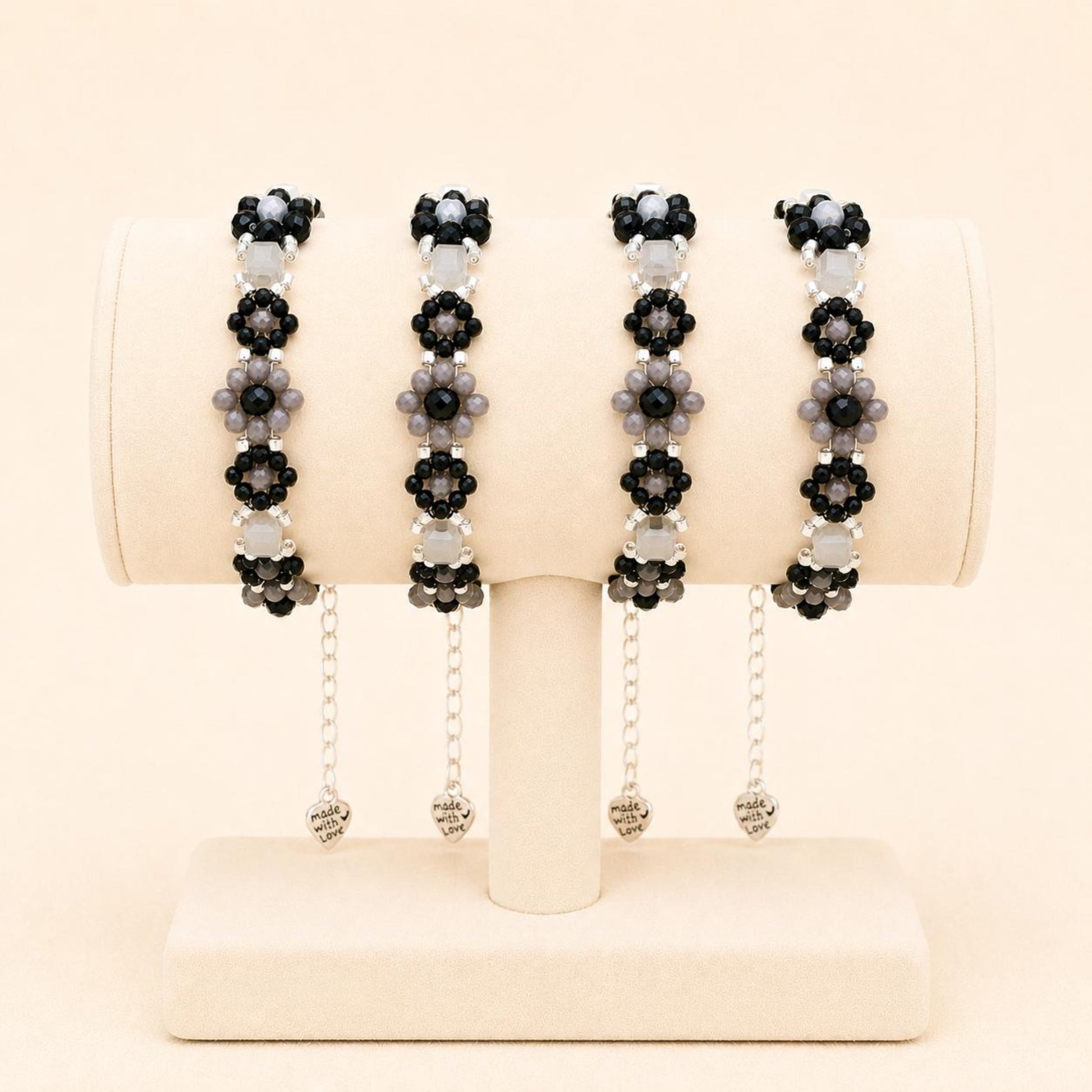 Handmade MIDNIGHT BLOSSOM bracelet with black, grey, and silver beads on stainless steel chain