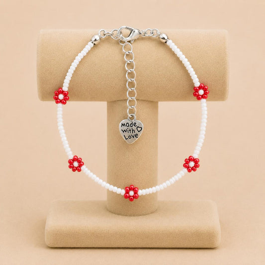 Red Bloom Delight handmade bracelet with white and red glass bead flowers on stainless steel chain