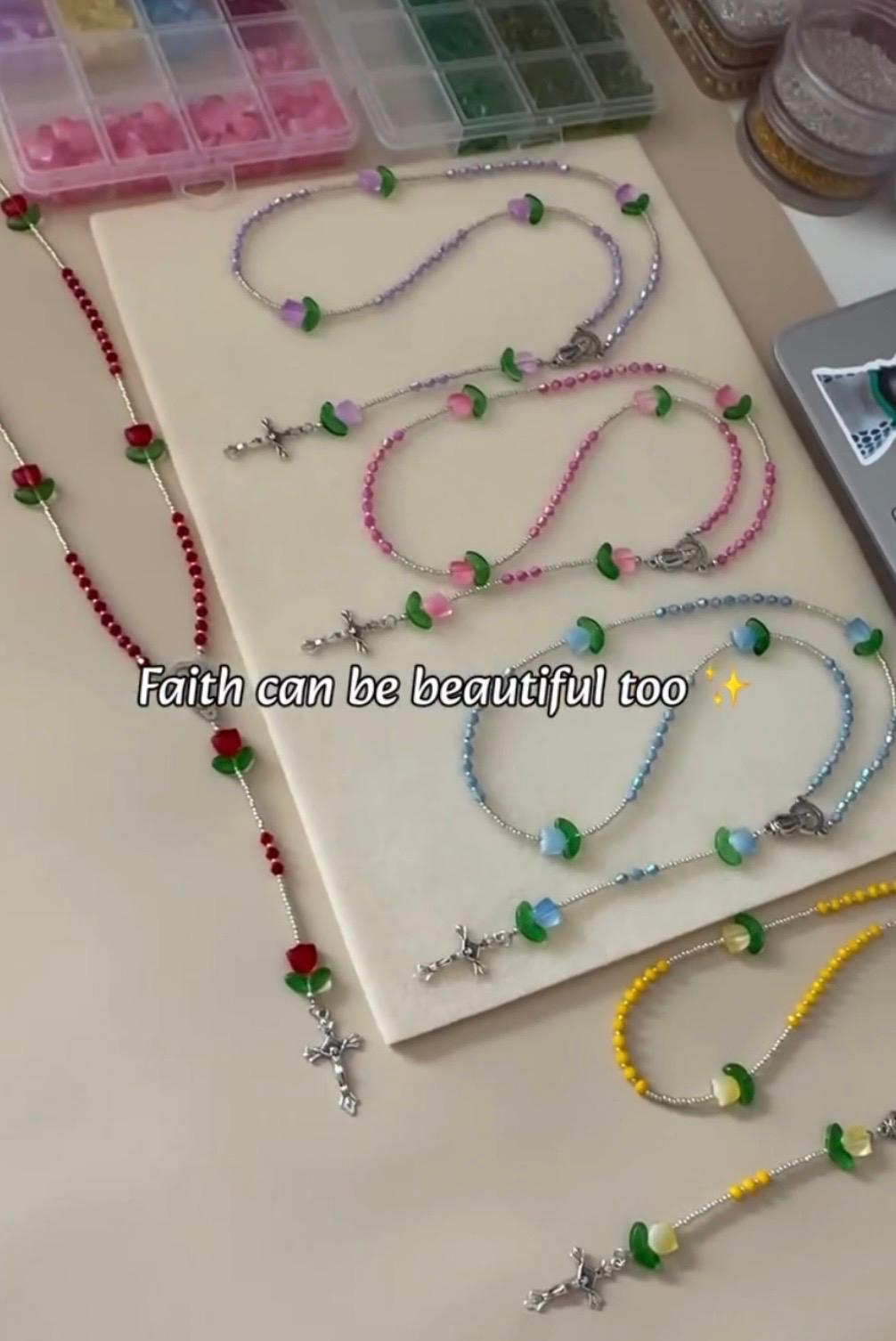 Handcrafted Blooming Faith rosary with glass beads and decorative flower accents for prayer and reflection