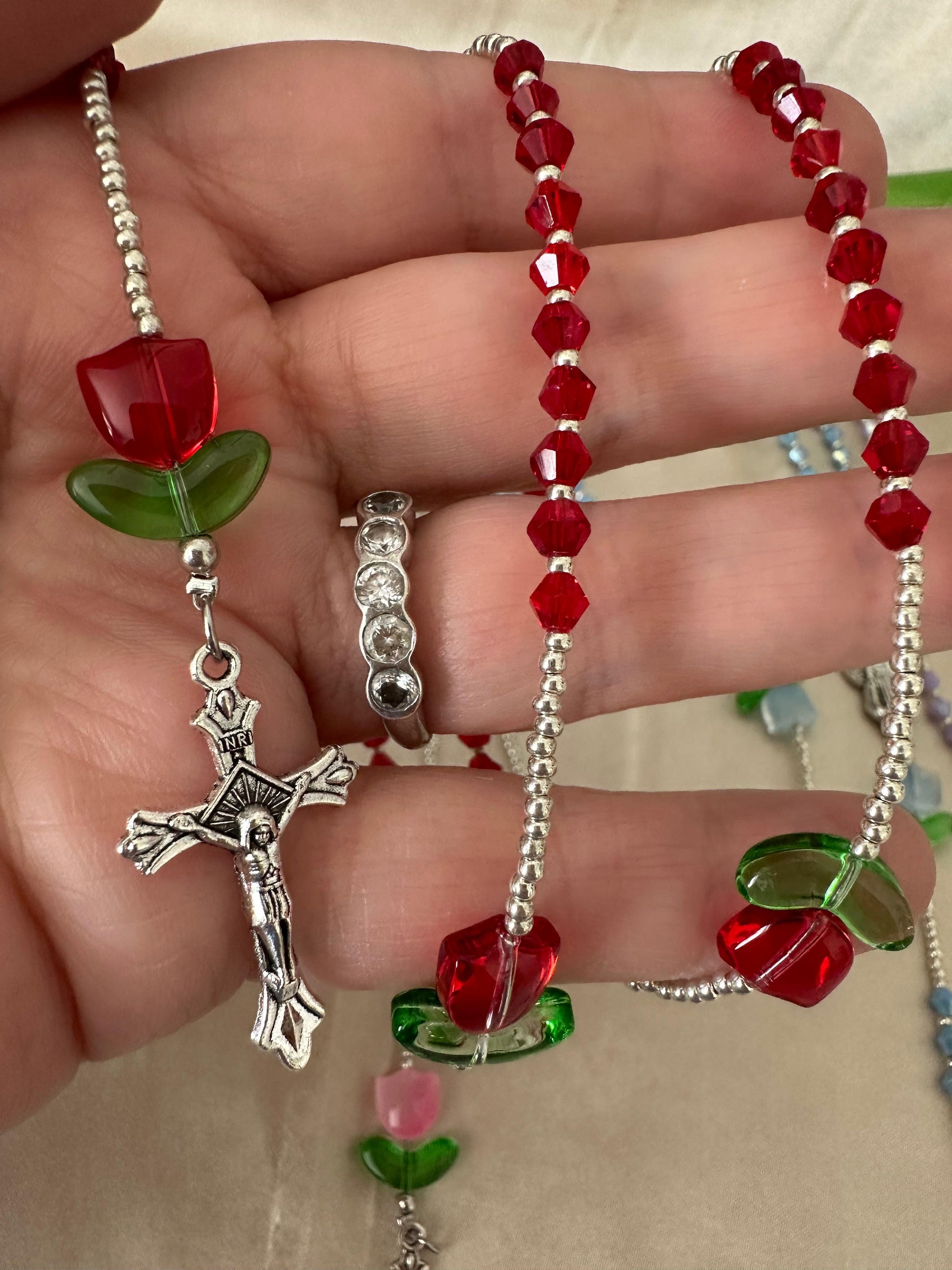 Handmade Blooming Faith rosary with colorful glass beads and silver crucifix for prayer