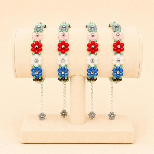 Handmade floral glass bead bracelet with colorful beads and silver accents on stainless steel chain