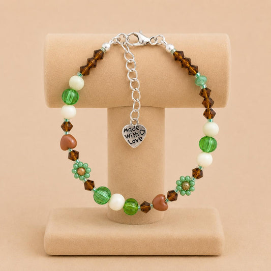 Handmade MORNING DEW bracelet with brown and green glass beads and floral details