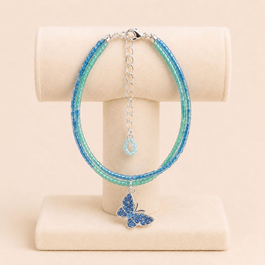 Handmade AZURE GLOW BUTTERFLY bracelet with green and blue Miyuki beads and silver butterfly charm