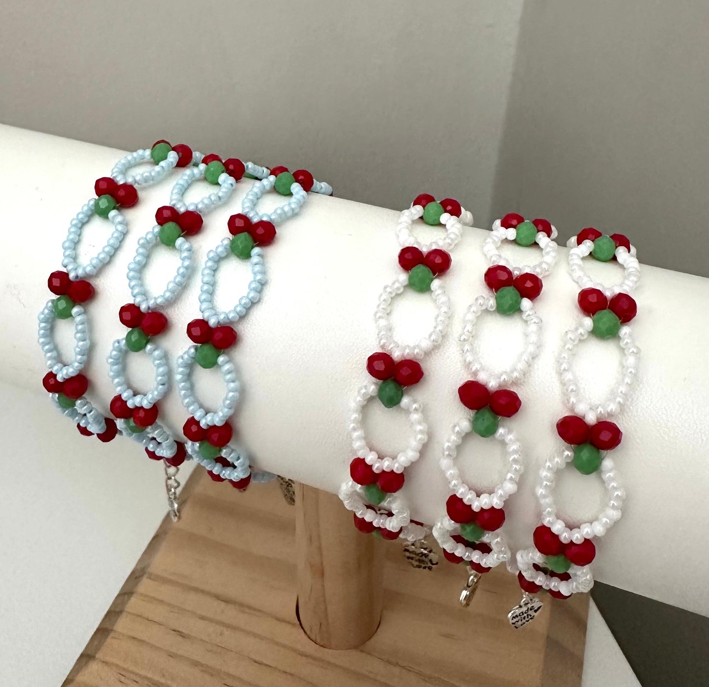 CHERRY BLOOM Handmade Bracelet with red, green, baby blue, and white glass beads on nylon cord with stainless steel clasp