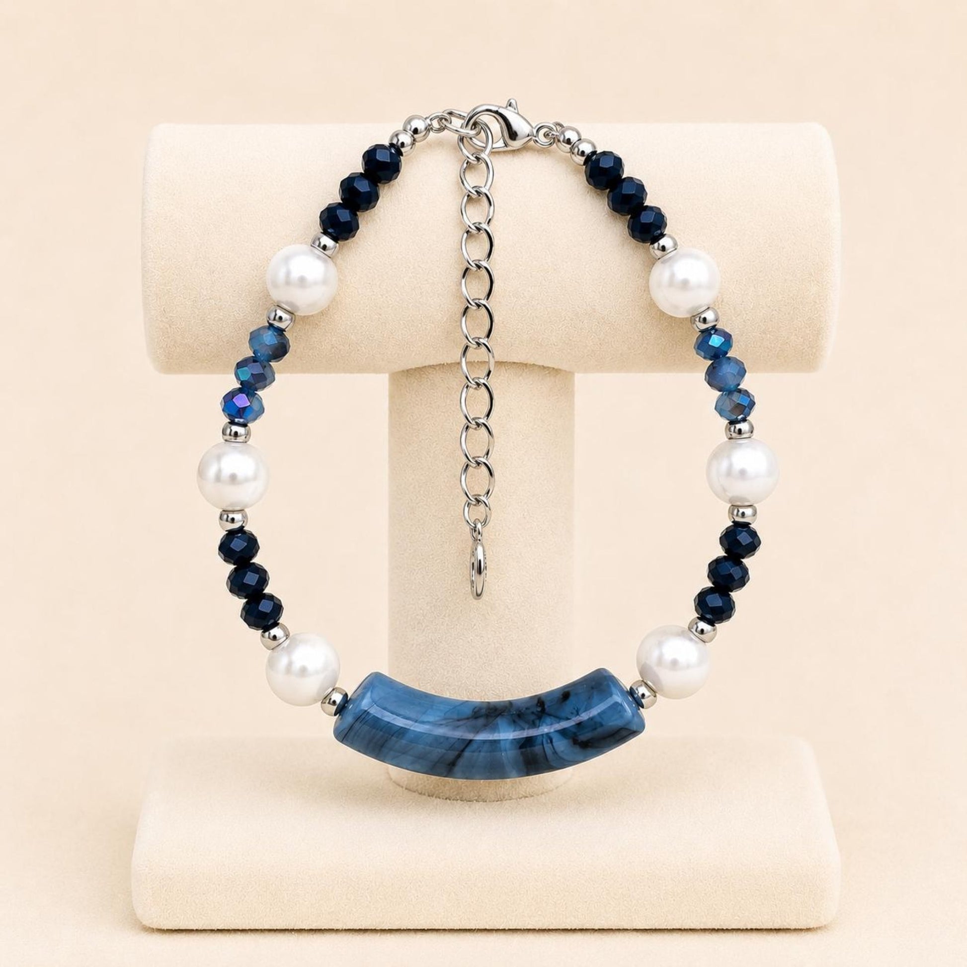 Handmade BLUE PEARL LUXURY bracelet with white faux pearls, blue crystal beads, and silver accents on a stainless steel chain