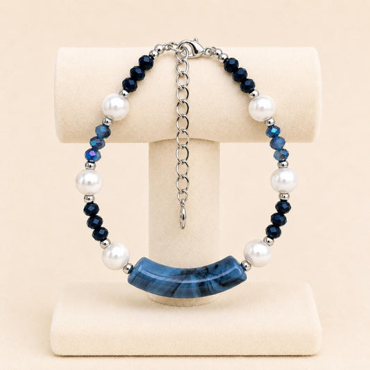 Handmade BLUE PEARL LUXURY bracelet with white faux pearls, blue crystal beads, and silver accents on a stainless steel chain