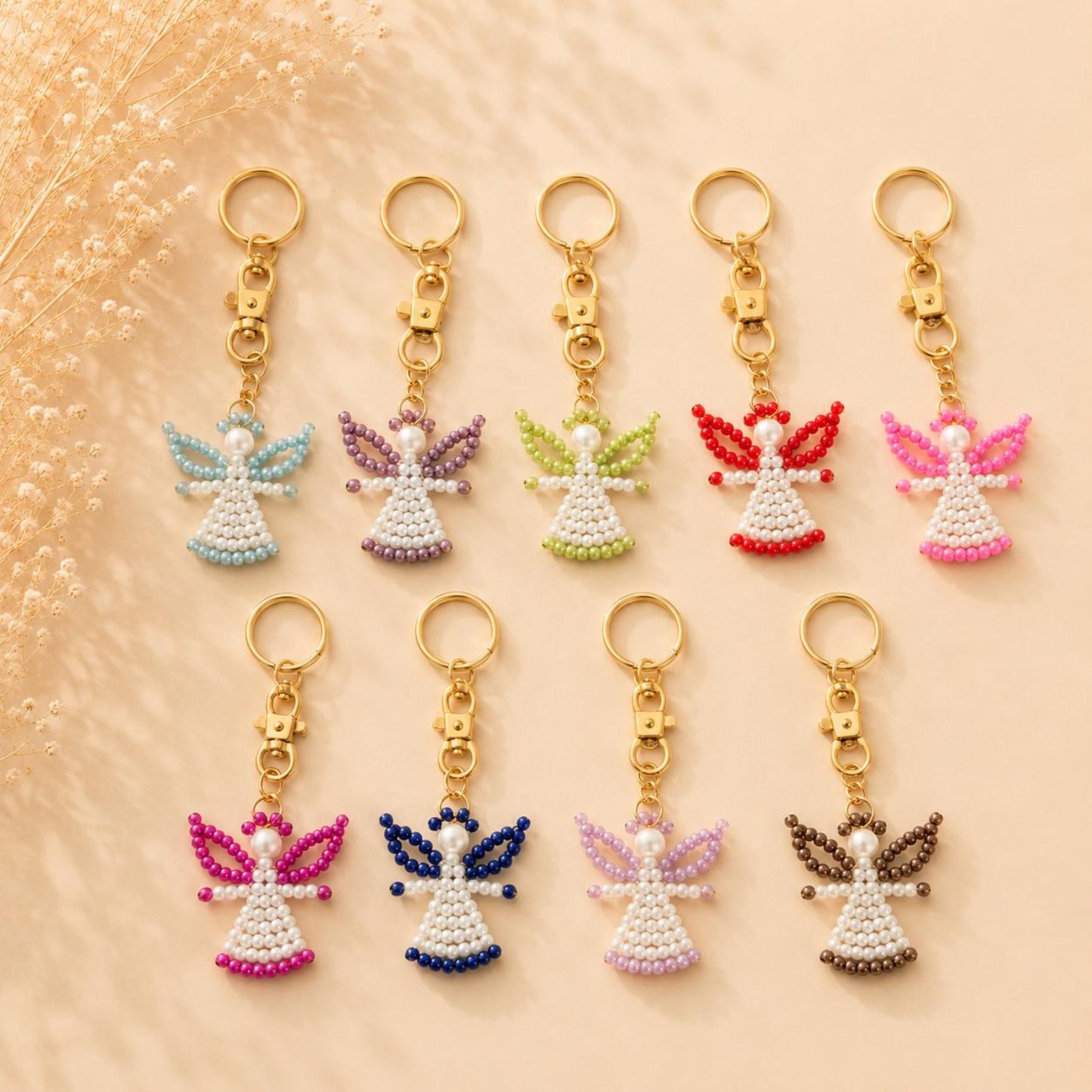 Handmade ANGEL golden keychain with white pearls and festive green and red glass beads