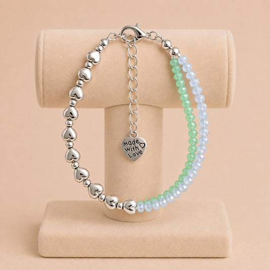 Handmade OCEAN BREEZE bracelet with blue and green crystal glass beads, silver accents, and adjustable stainless steel clasp
