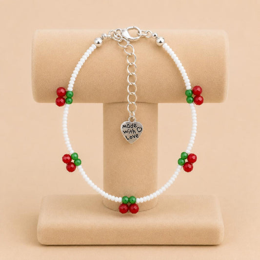 Handmade CHERRY DELIGHT bracelet with white, red, and green glass beads and stainless steel clasp