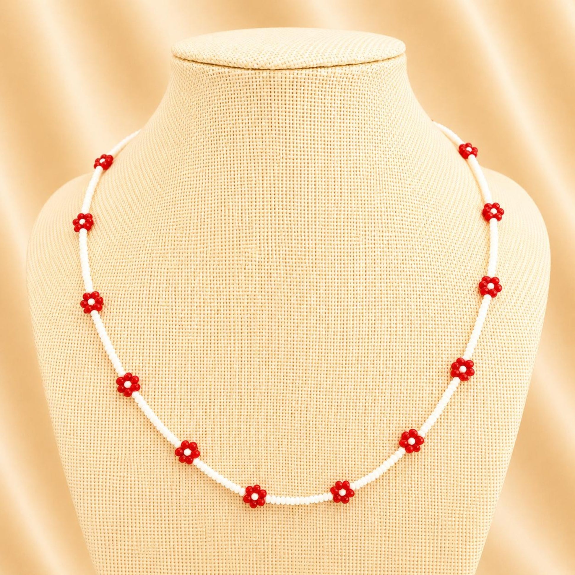 Handmade red and white beaded necklace with floral design and stainless steel clasp
