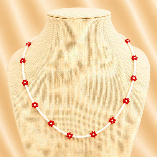 Handmade red and white beaded necklace with floral design and stainless steel clasp