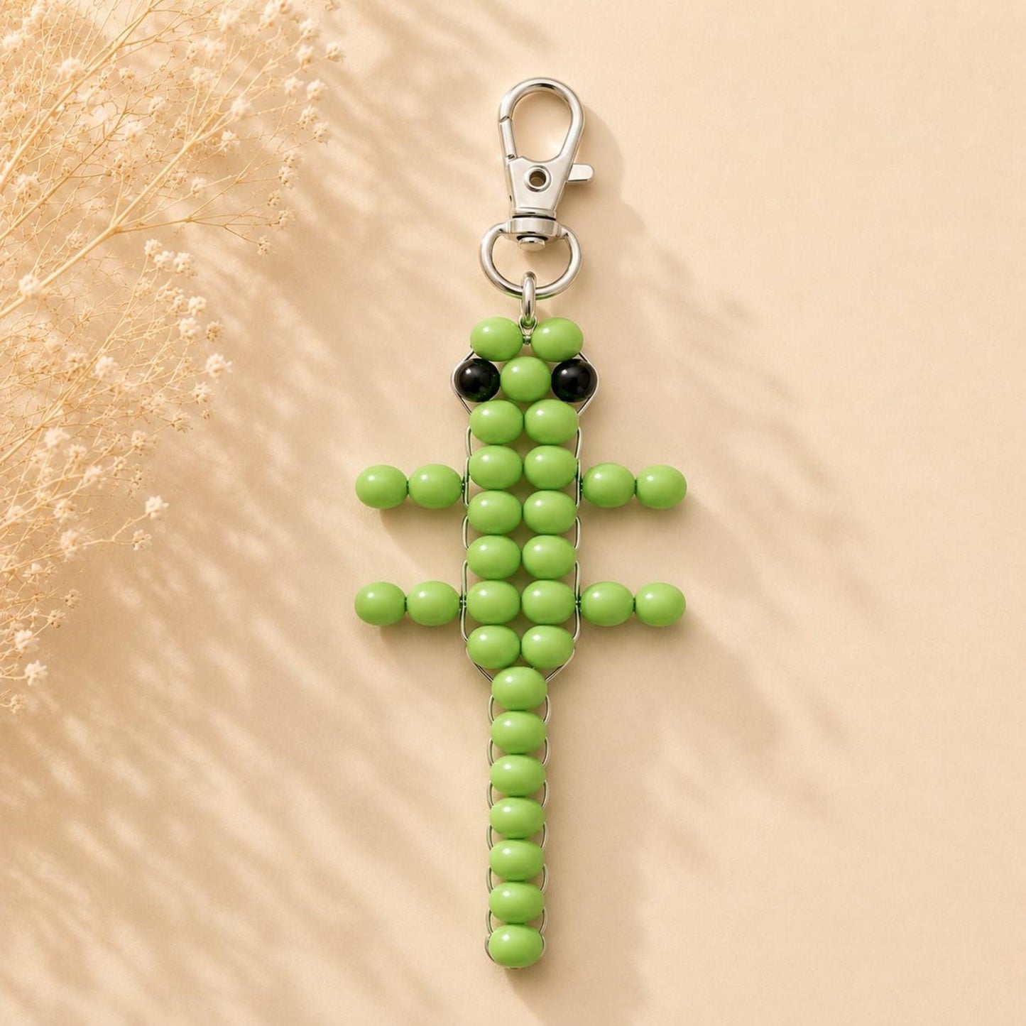 Handmade green lizard beaded keychain with silver clasp