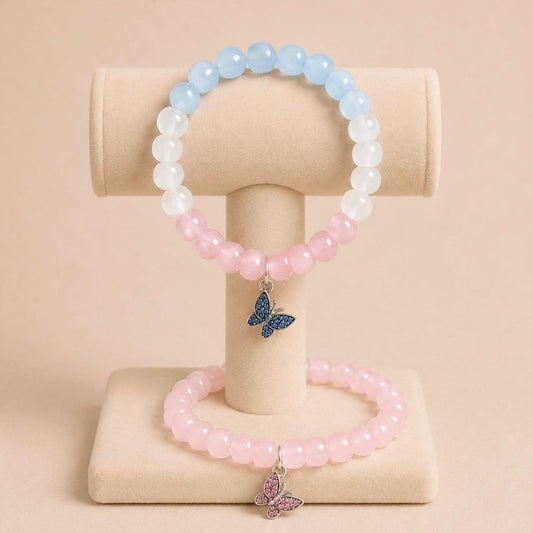 Elegant butterfly stretch bracelet with pink and blue glass beads and silver charm