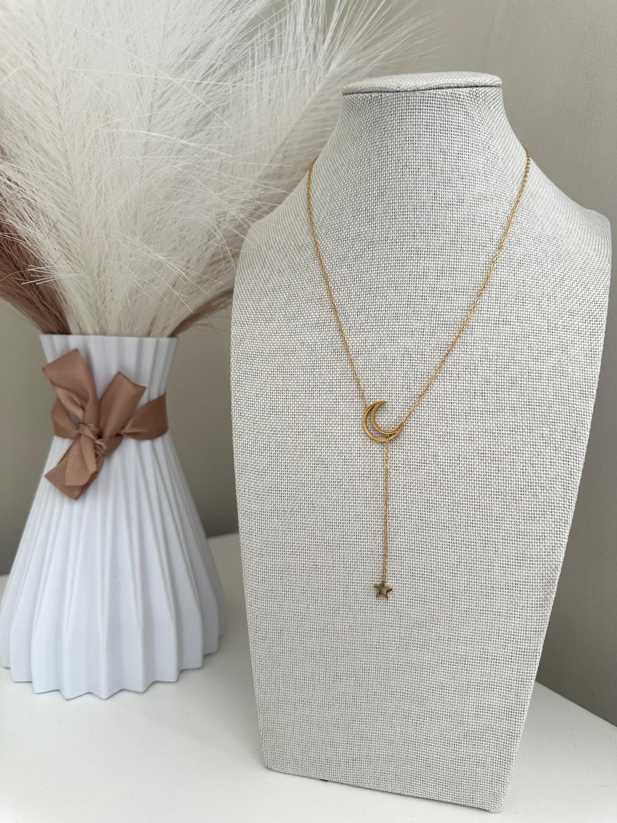 Stainless steel crescent moon and star drop necklace with 40cm chain on white background
