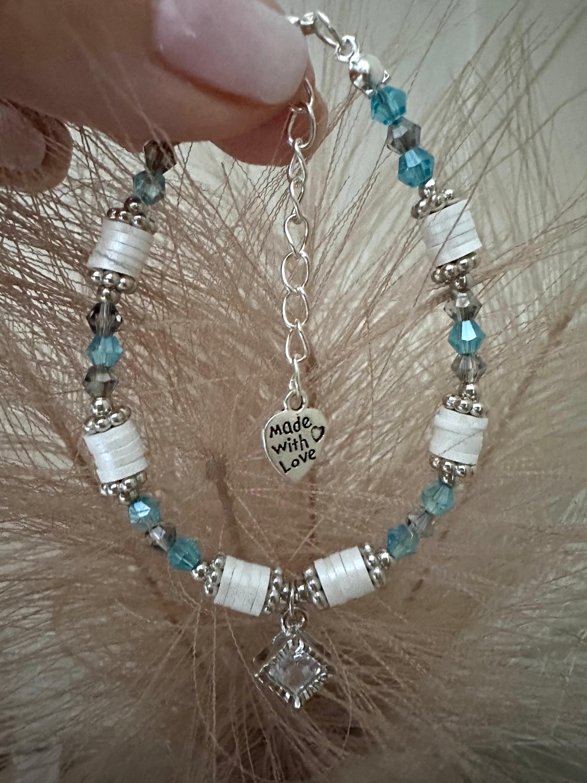 SOFT HARMONY Handmade Bracelet with grey and turquoise crystal beads, silver accents, and adjustable stainless steel clasp