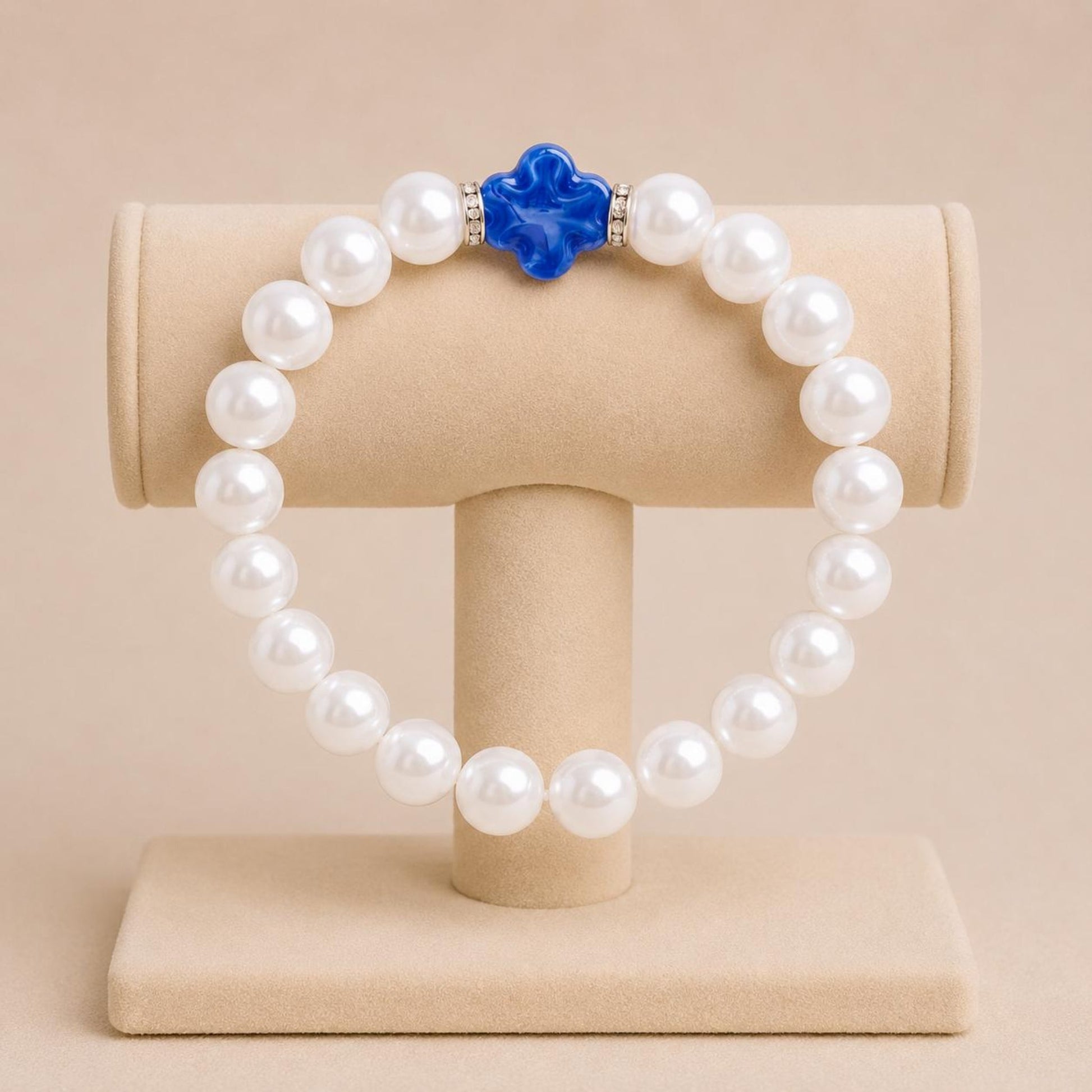 Dreamy Pearl Garland stretch bracelet with white faux pearls, silver rhinestone spacers, and blue flower bead on elastic band