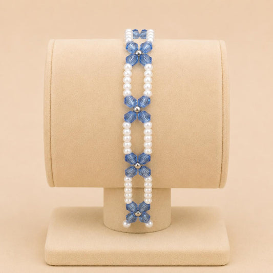 MARINE BREEZE stretch bracelet with white faux pearls, silver, and blue crystal beads on elastic band