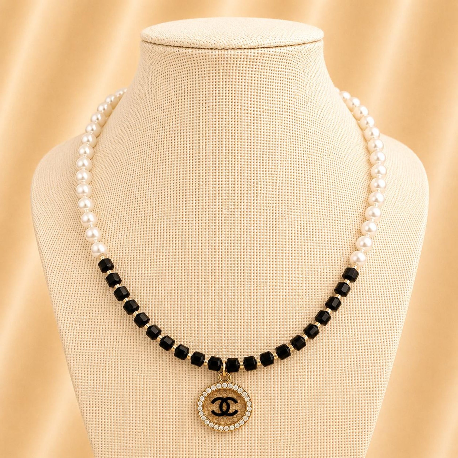 Handmade LUXE PEARL CUBES necklace with black cube beads, white faux pearls, and 18K gold plated chain