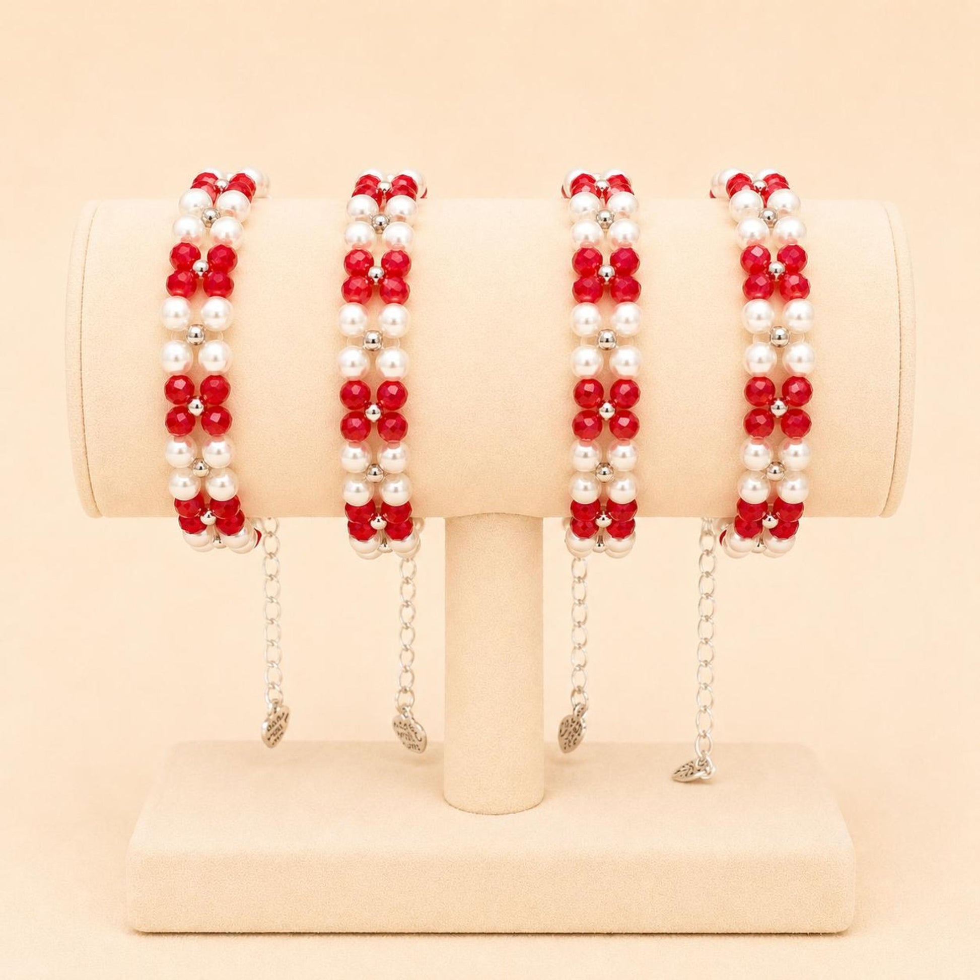 Handmade ETERNAL BALANCE bracelet with red crystal beads, ivory faux pearls, and silver accents