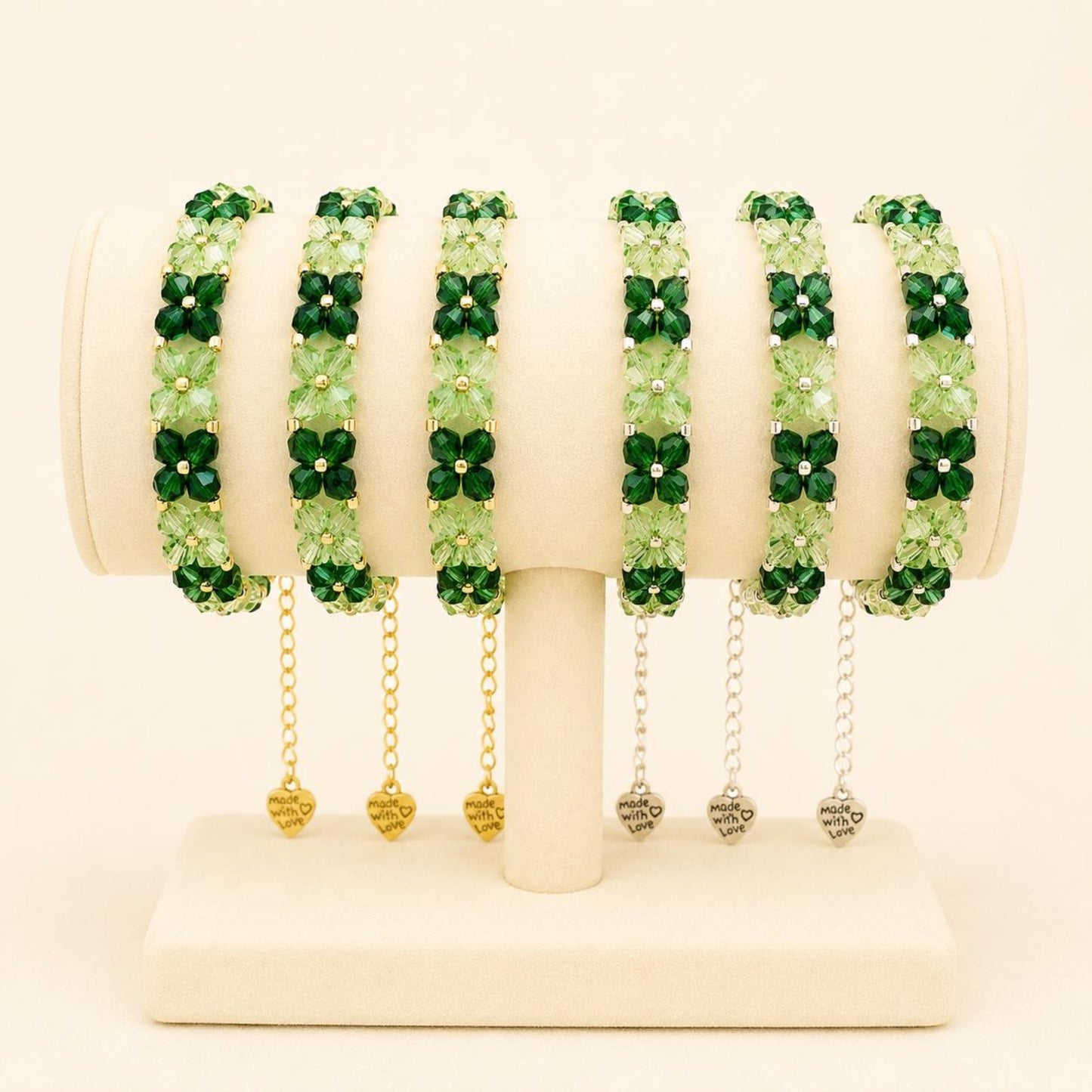 Handmade green crystal bracelet with gold and silver beads on stainless steel chain