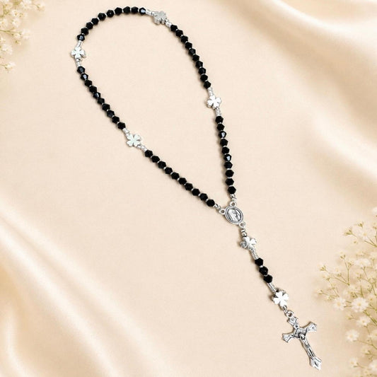 Black Grace Handmade Rosary with black crystal beads, silver-tone accents, and four-leaf clover spacers