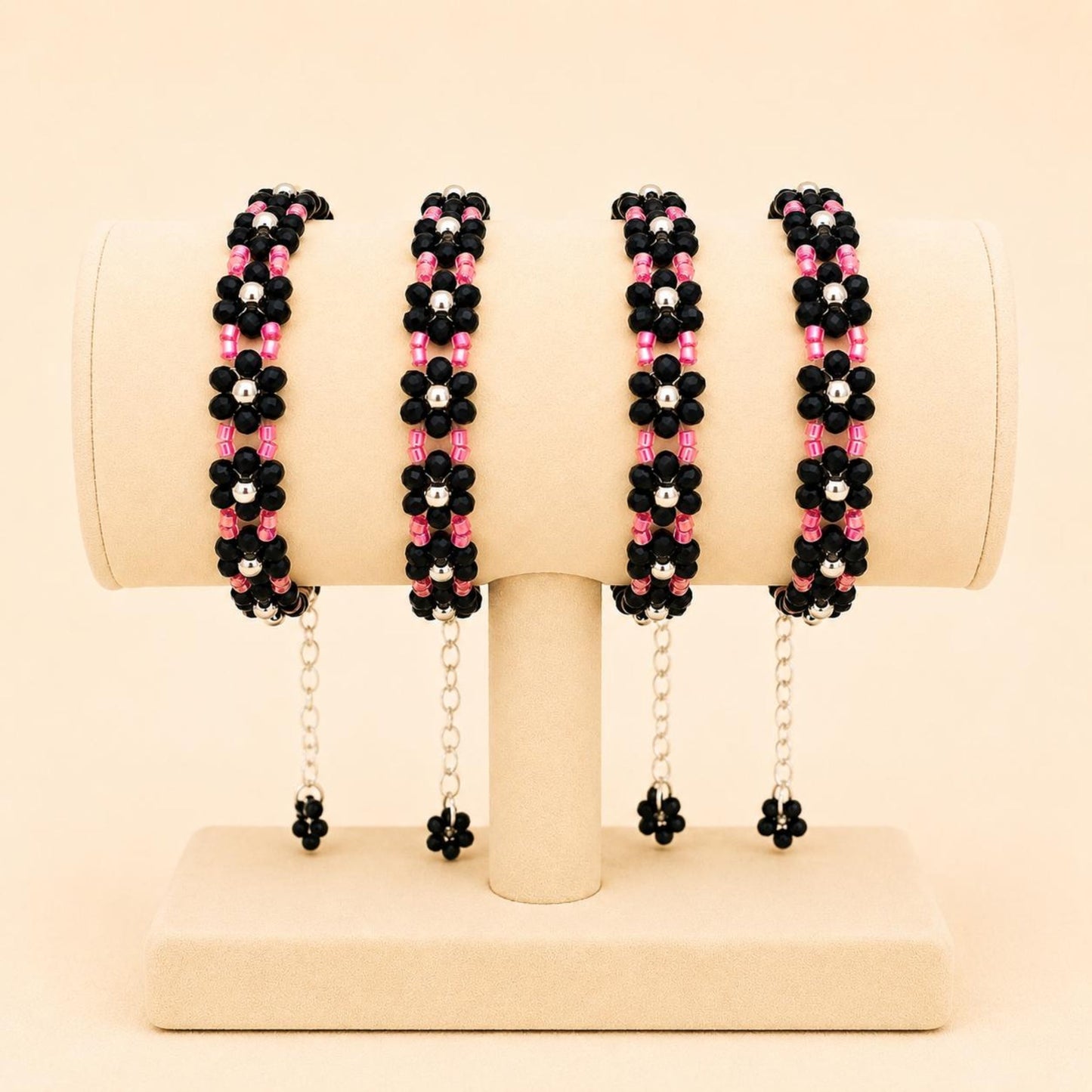 NOIR BLOSSOM handmade bracelet with black, silver, and red beads on nylon string with stainless steel clasp