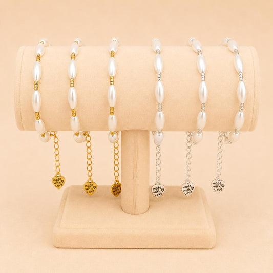 Handmade PEARL DREAMS bracelet with ivory faux pearls and gold or silver beads, adjustable length