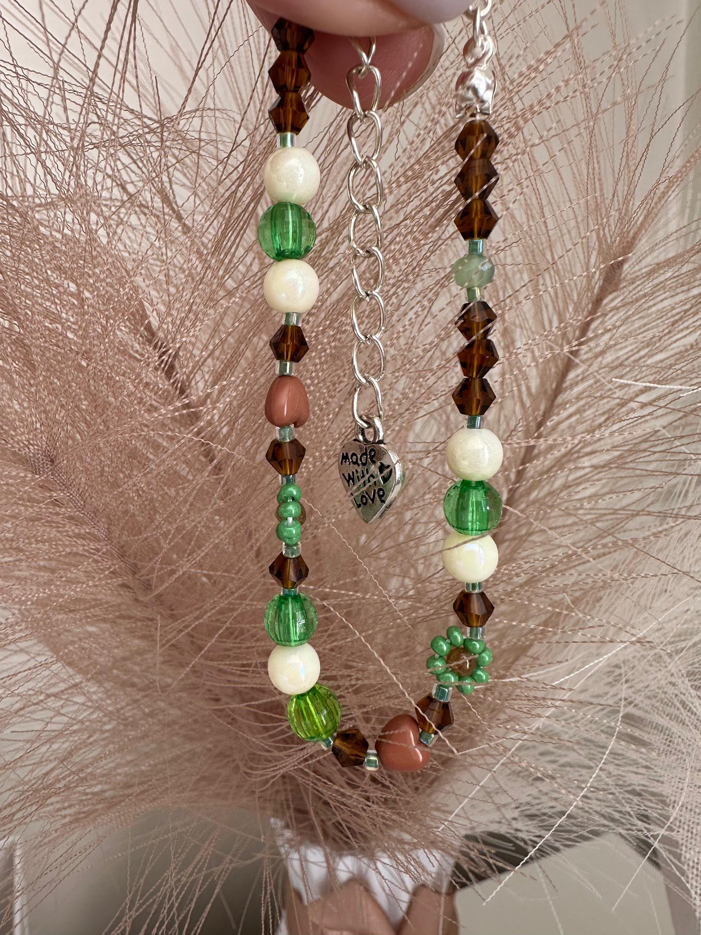 Handmade MORNING DEW bracelet with brown and green glass beads and floral details