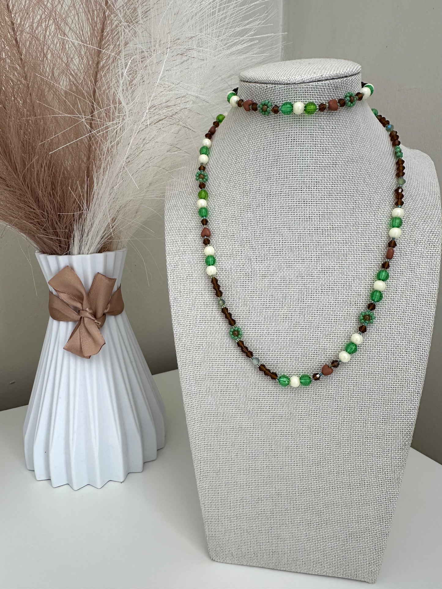 Handmade MORNING DEW bracelet with brown and green glass beads and floral details