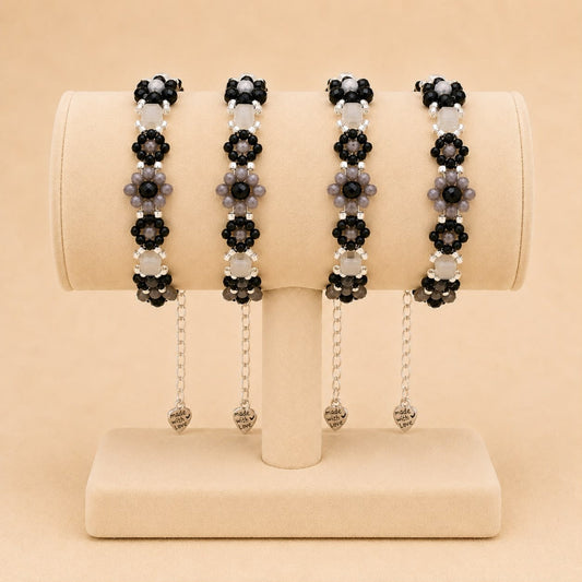 Handmade MIDNIGHT BLOSSOM bracelet with black, grey, and silver beads and stainless steel clasp