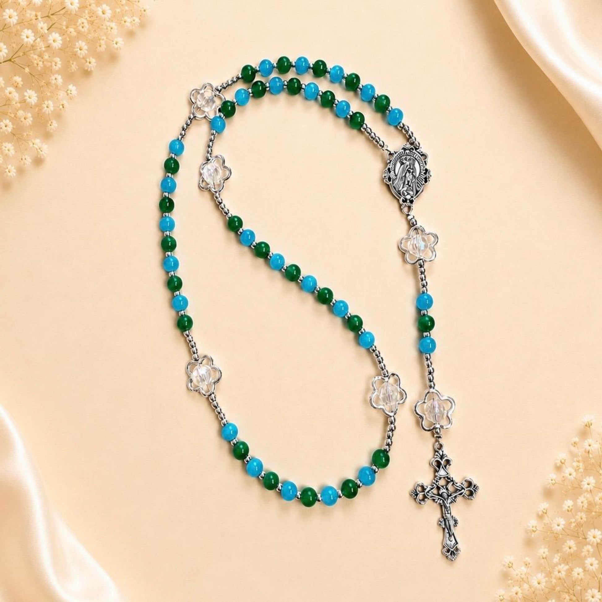 Ocean Bloom Handmade Rosary with green and turquoise beads, silver flower accents, and crucifix.