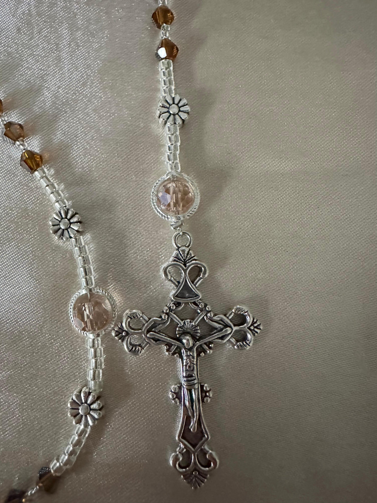 Amber & Champagne Handmade Rosary with faceted amber and clear champagne beads, silver-tone floral spacers and ornate crucifix