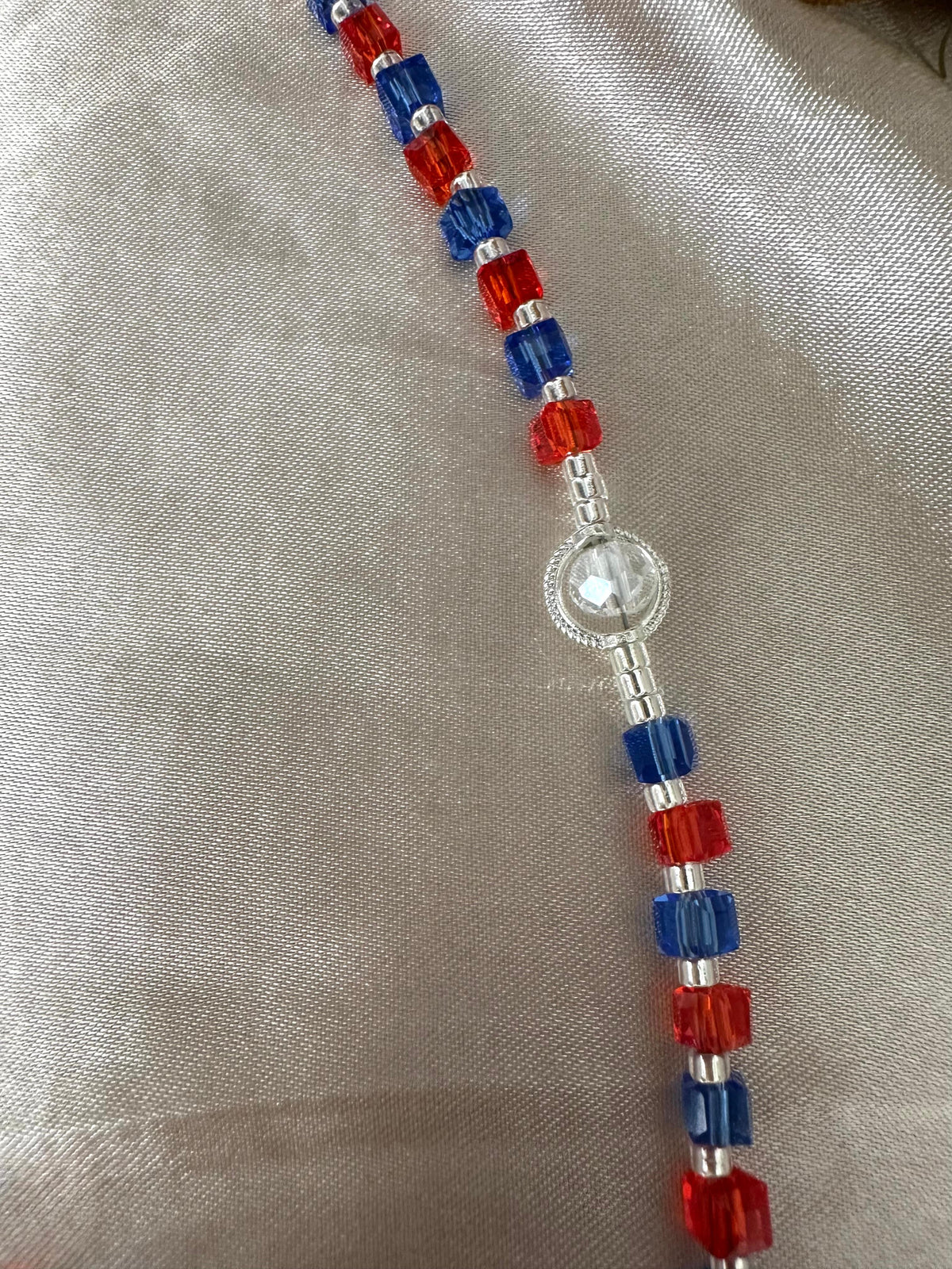 Crimson Indigo Grace handmade rosary with red and indigo beads and silver accents
