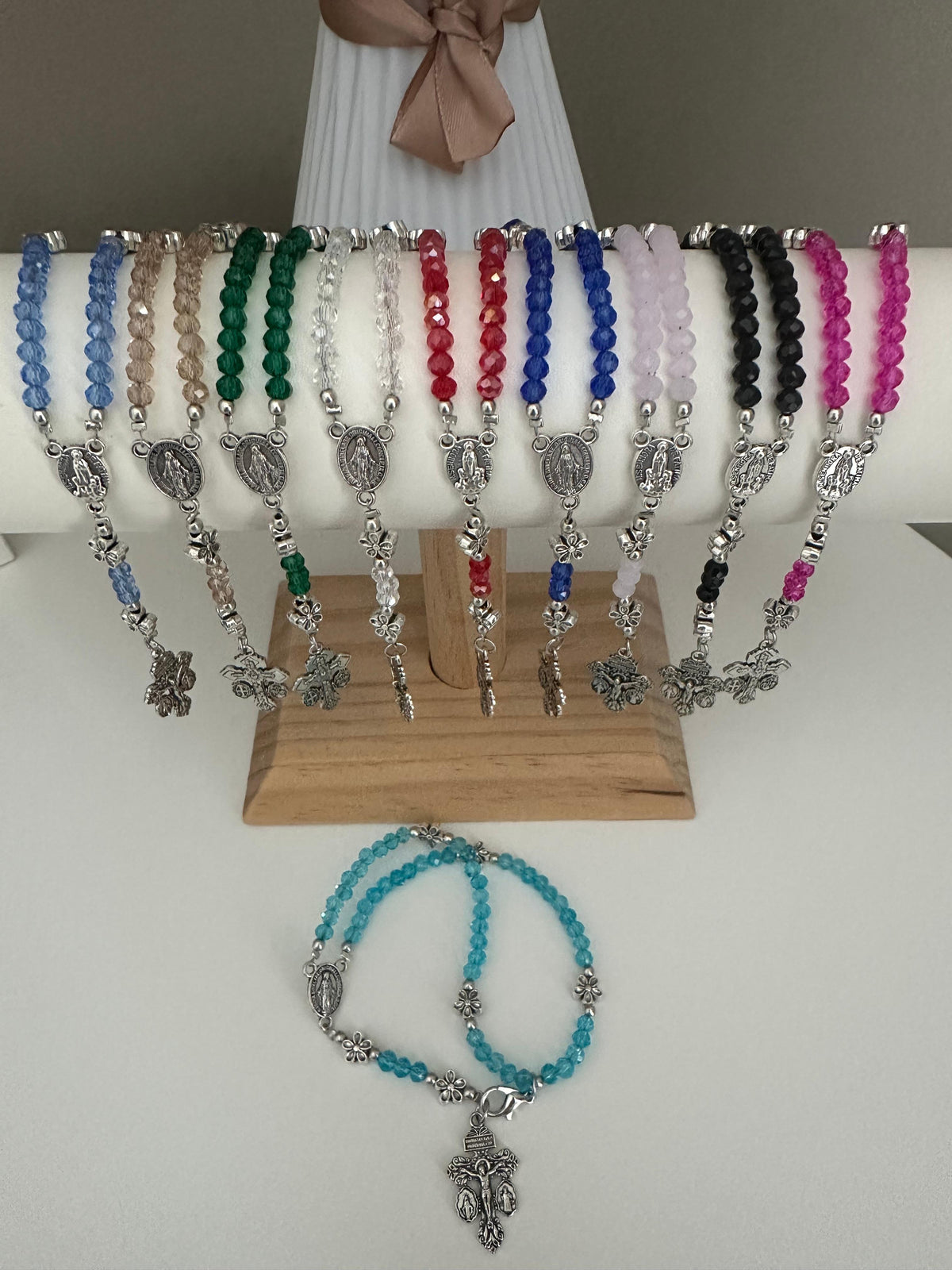 Grace in Bloom Silver-Tone rosary bracelet with turquoise glass beads, silver-tone floral accents, Mary medallion and crucifix.