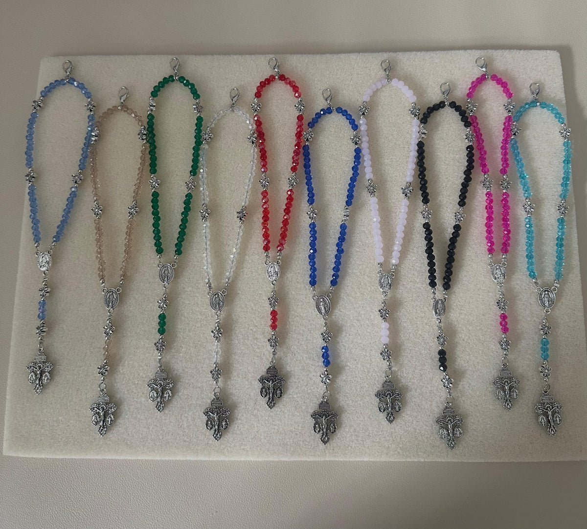 Grace in Bloom Silver-Tone Rosary Bracelet, glass bead strands in assorted colors with silver-tone floral accents and ornate crucifixes.