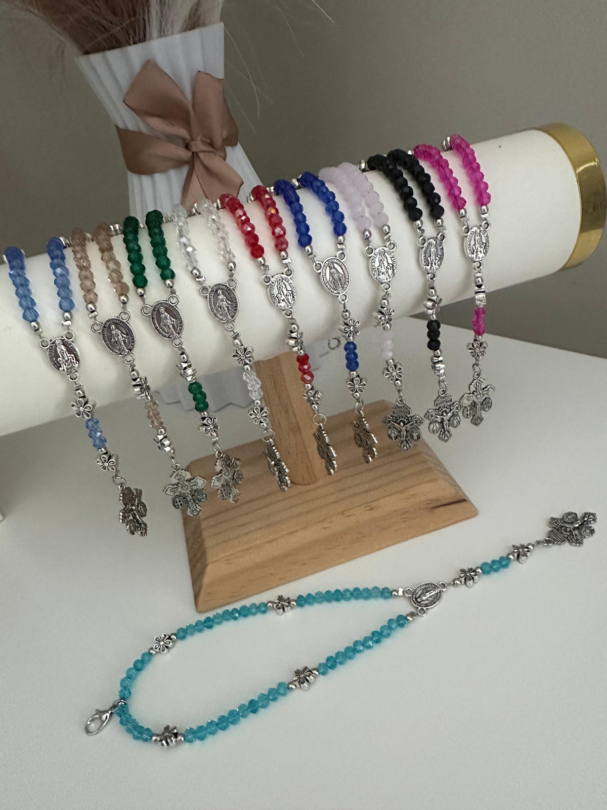 Grace in Bloom Silver-Tone rosary bracelets in assorted glass bead colours, with silver-tone floral accents, Mary centres and crucifixes.