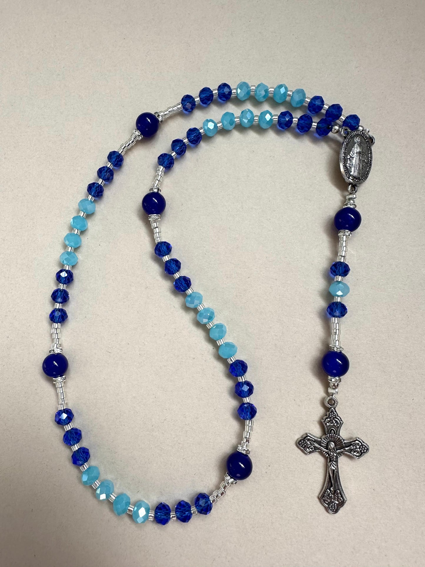 Indigo Sky Grace handmade rosary with indigo and baby blue beads