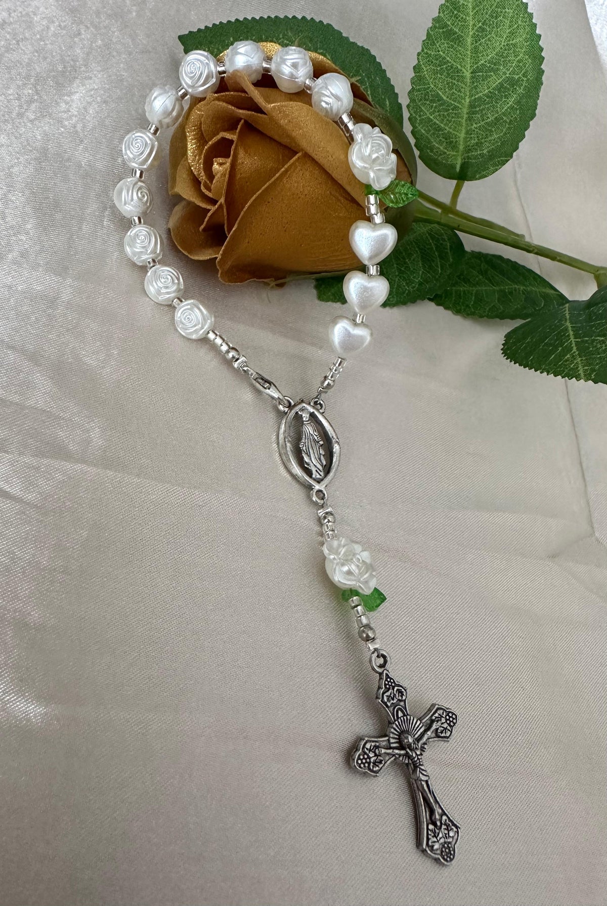 Ivory rose mini rosary with clasp featuring faux pearl beads and silver crucifix