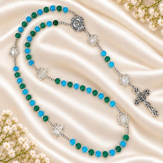 Ocean Bloom Handmade Rosary featuring green and turquoise glass beads with silver-tone flower-shaped and crucifix accents