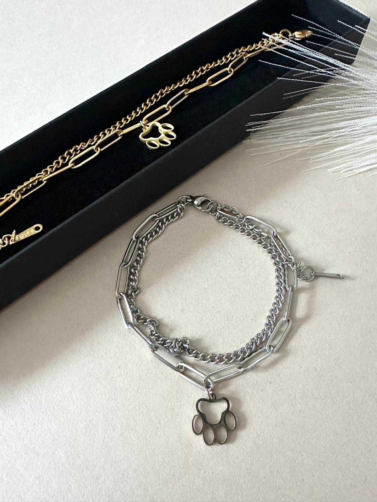 paw print double chain stainless steel bracelet in gold and silver