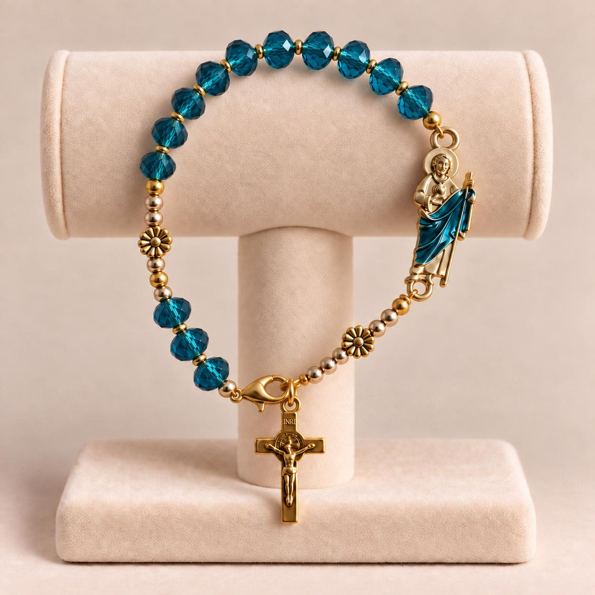 Sacred Hope Handmade Rosary Bracelet with teal faceted glass beads, gold-tone accents, saint centerpiece and crucifix